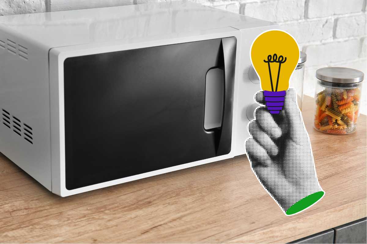 Microonde e mano stilizzata con una lampadina: idea