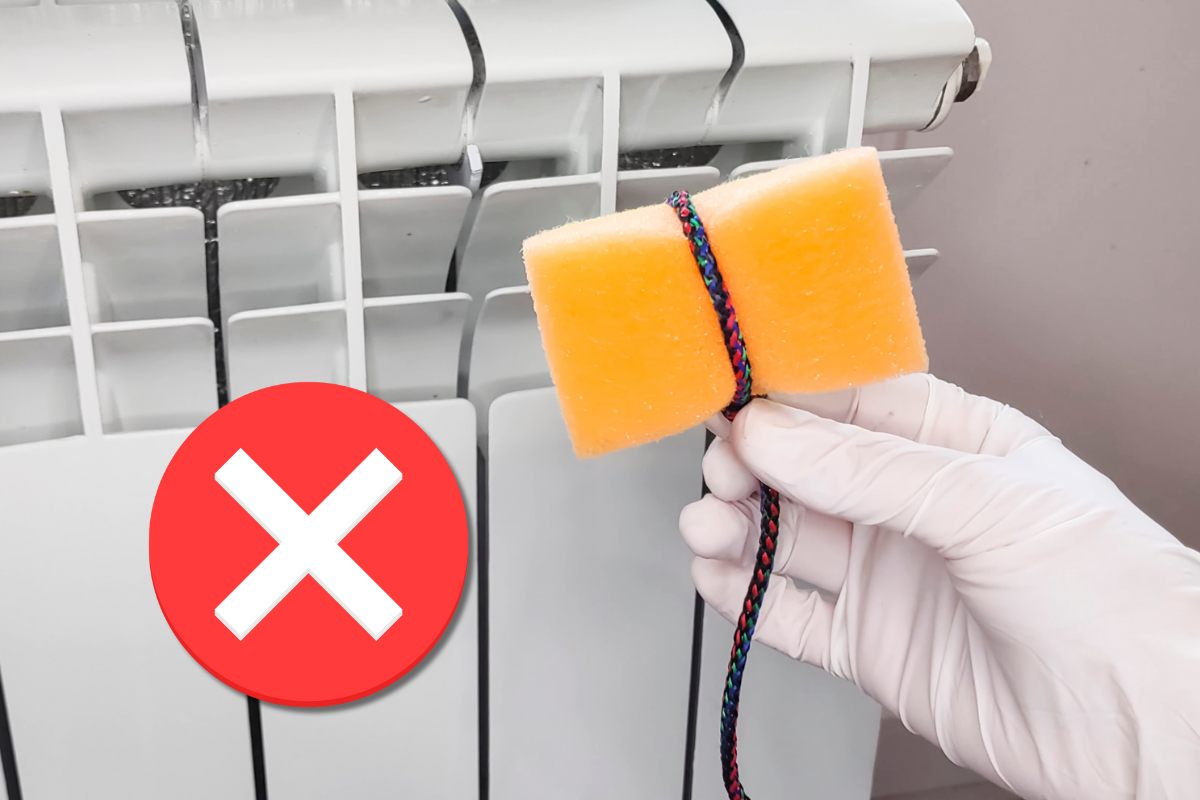 Trucco della spugna con la corda per lavare i caloriferi e simbolo X in primo piano